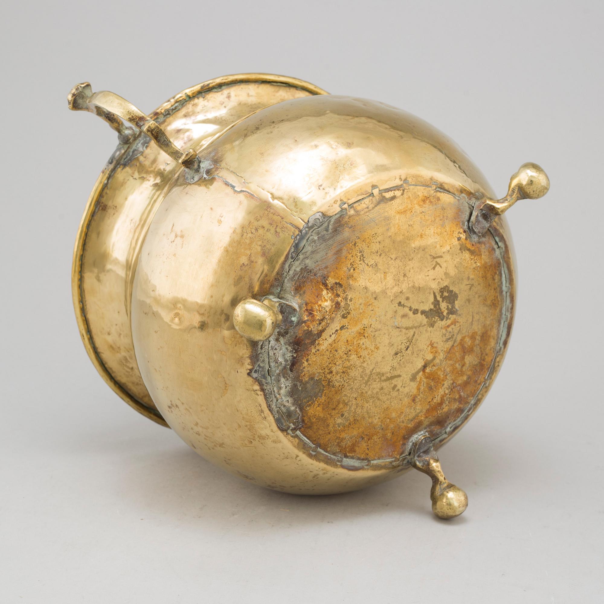 A 19th century brass flower pot.
