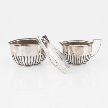 Creamer, sugar bowl, and sugar tongs, silver.