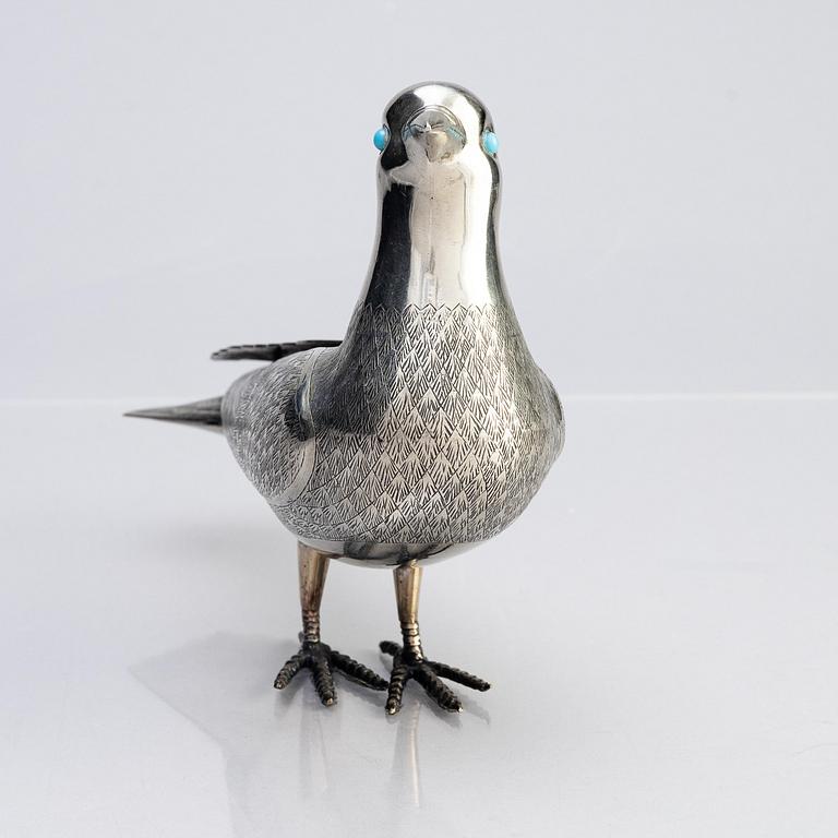 A Persian silver pigeon, the Qajar dynasty (1789–1925).