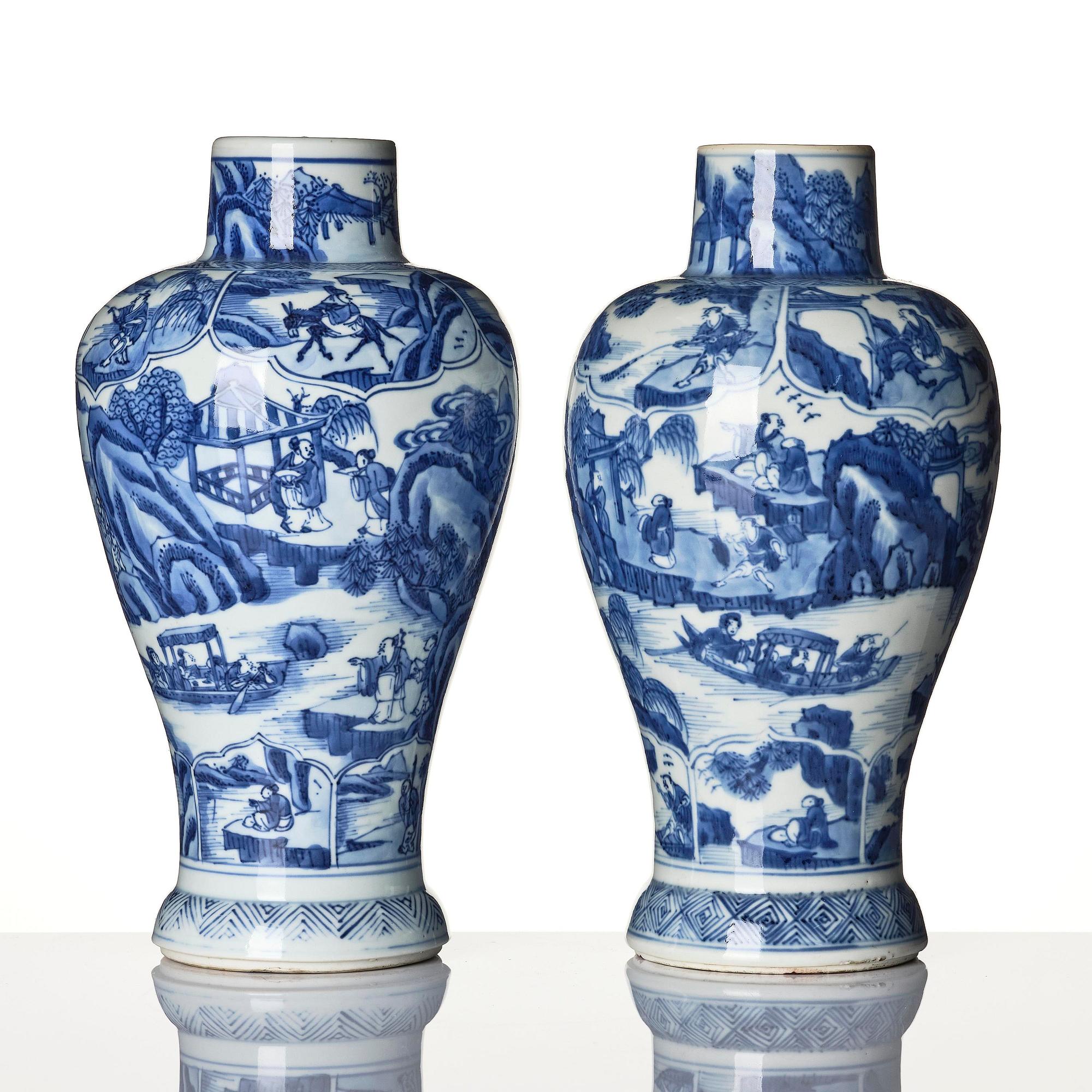 A pair of blue and white 'landscape' vases, Qing dynasty, Kangxi (1662-1722).