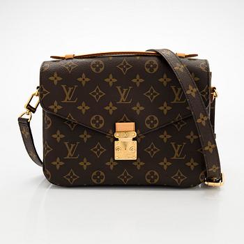 Louis Vuitton, a Monogram Canvas 'Pochette Metis' bag.