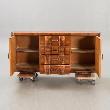 A walnut Art Deco 1940s sideboard.