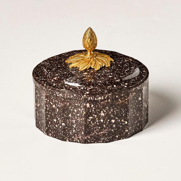 A Swedish Empire porphyry butter box with cover, 19th century.