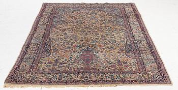 A semi antique Kirman rug, South Persia, c. 228 x 136 cm.