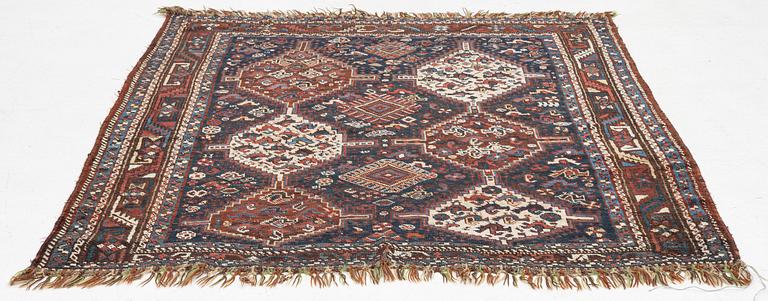 An antique rug, Shiraz, ca. 180 x 155 cm.