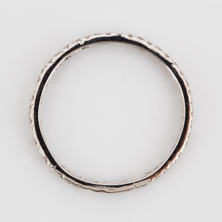 White gold brilliant-cut diamond eternity ring.