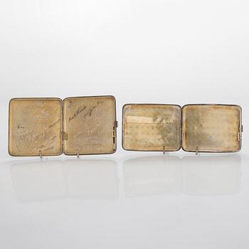 Two silver cigarette cases, J. H. Werner, Berlin, 1922, and Huguenin Frères, Switzerland before 1933.