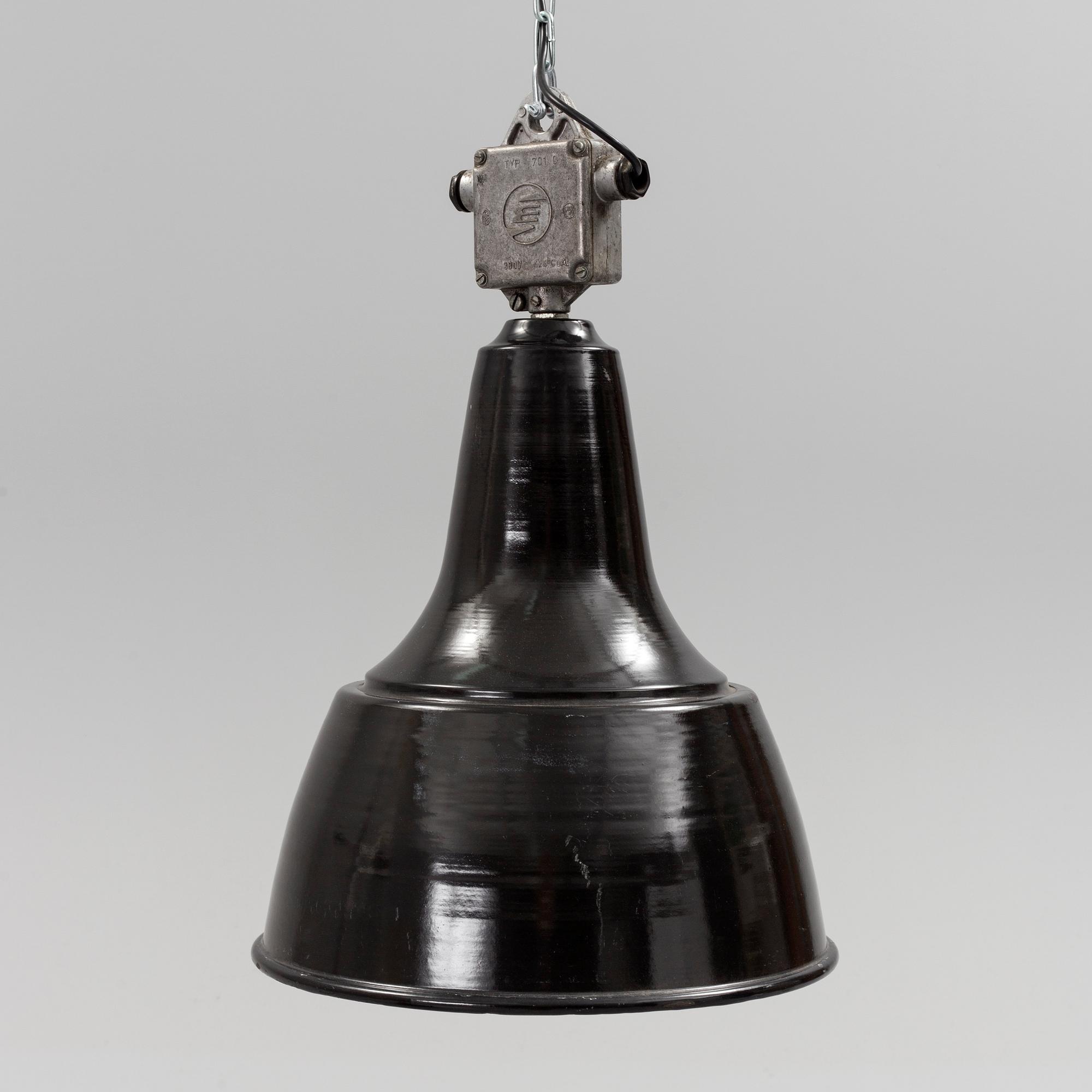 A mid 20th century metal ceiling light. Height ca 55 cm.
