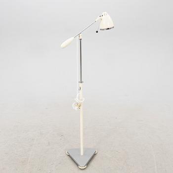 A mid 1900s industrial floor lamp.