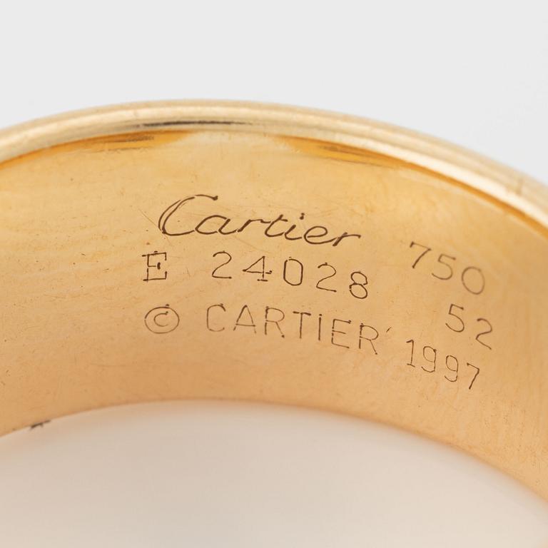 Cartier "Double C" ring in 18K tri-colour gold with round brilliant-cut diamonds.