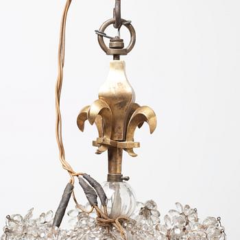 A Baroque-style 19th century twelve-light chandelier.