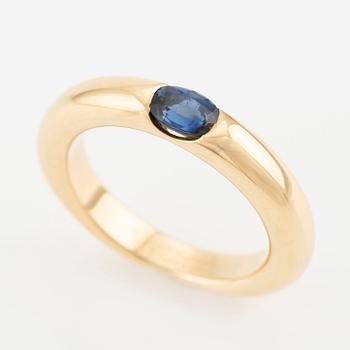 Cartier, ring, "Ellipse", 18K gold with faceted sapphire.