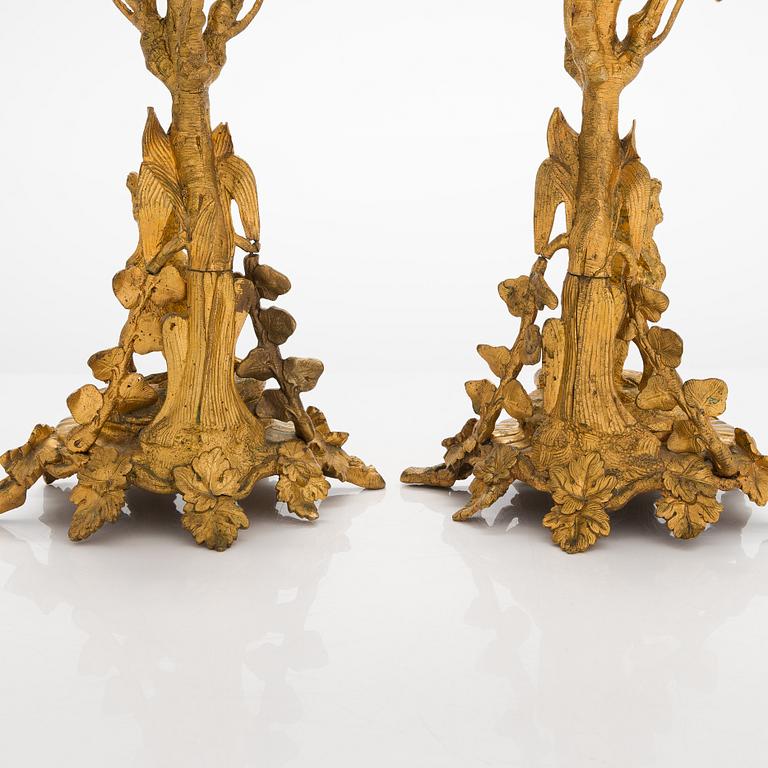 A pair of gilt brass candelabra from the latter half of the 19th century.