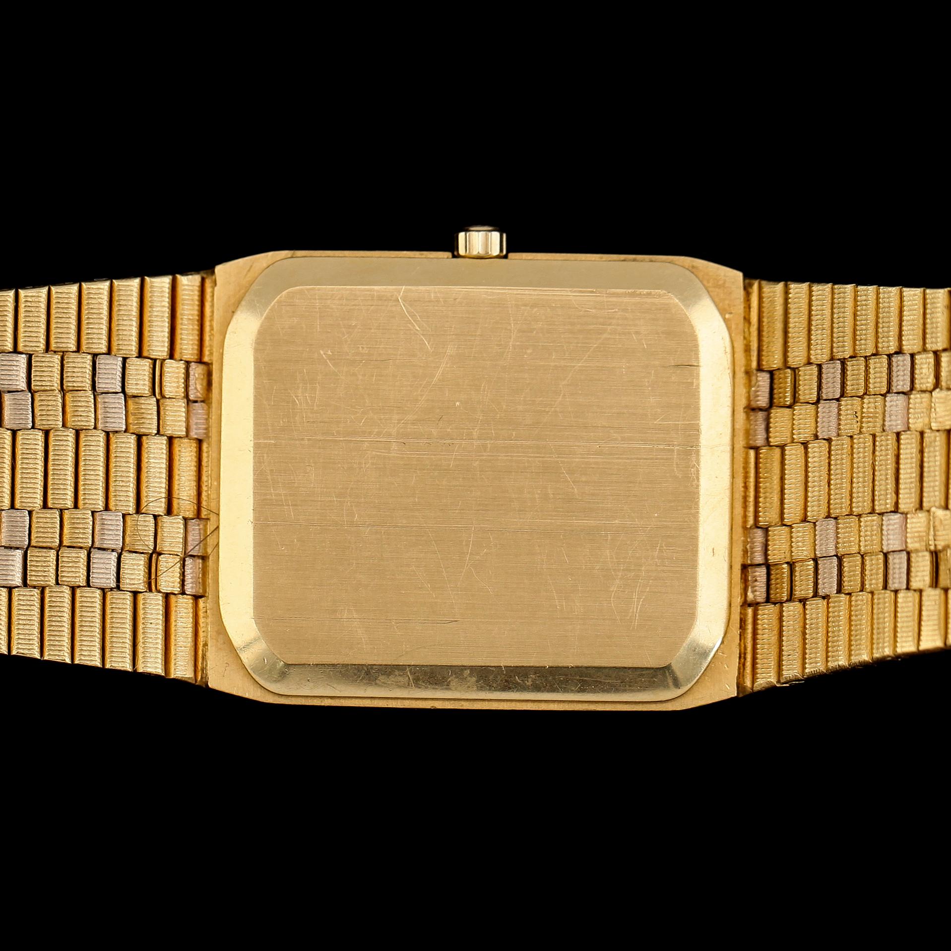 ARMBANDSUR, 18K tvåfärgat guld, Tissot Saphir, sannolikt 1980-tal. Total vikt inklusive urverk ca 80 g.