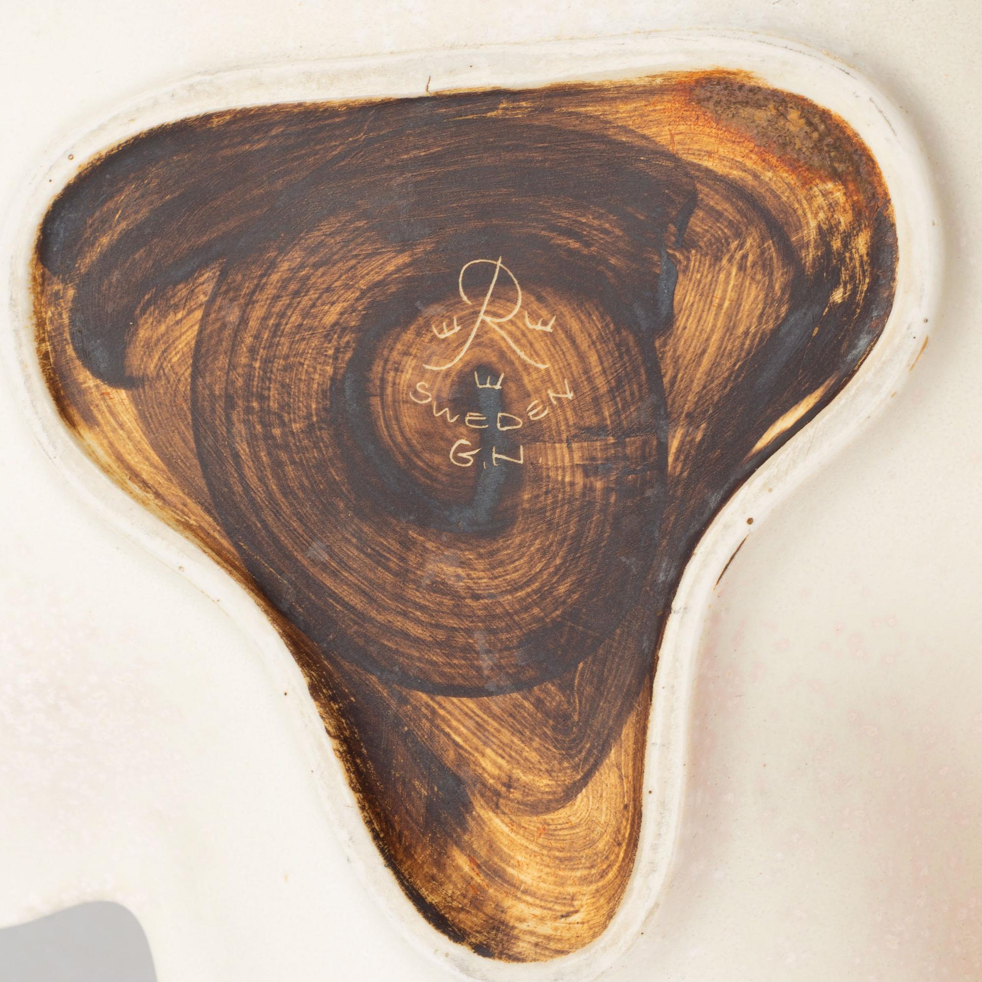 Gunnar Nylund, a stoneware dish and three bowls, Rörstrand, Sweden.