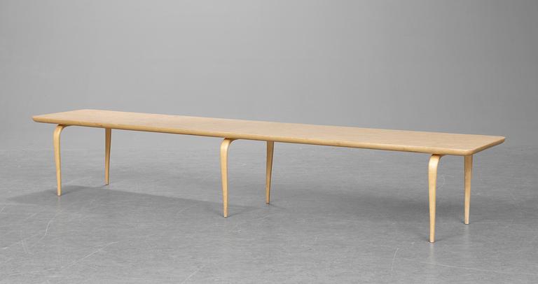 A Bruno Mathsson birch root and beech table for magazines, Firma Karl Mathsson, Sweden 1978.