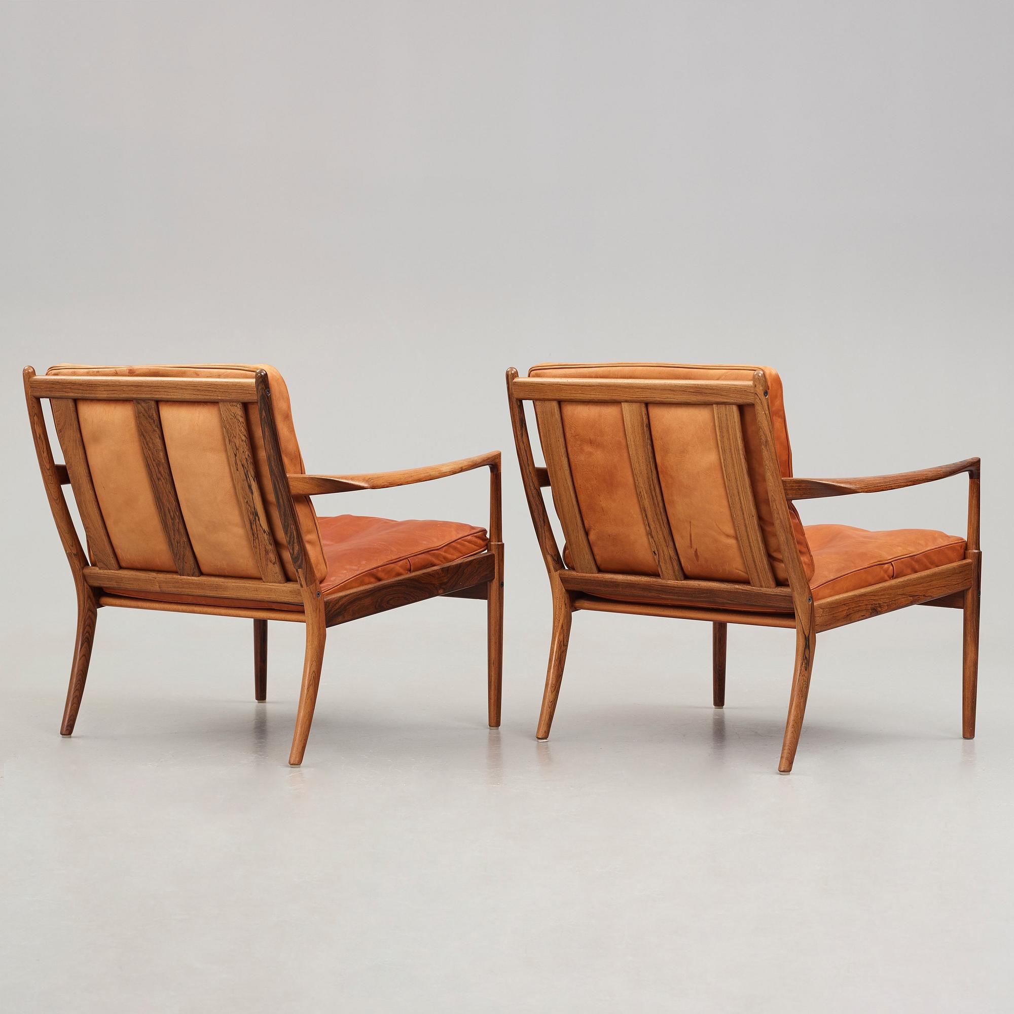 Ib Kofod-Larsen, a pair of "Samsö" palisander and brown leather easy chairs, Olof Persons Fåtöljindustri (OPE) Sweden 1960's.