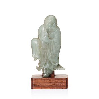 1133. A carved nephrite sculpture of a lohan, Qing dynasty (1664-1912).