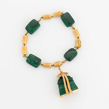 A 14K gold and malachite bracelet.