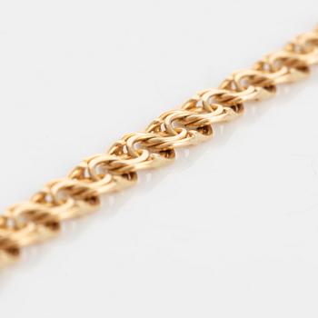 18K gold necklace.