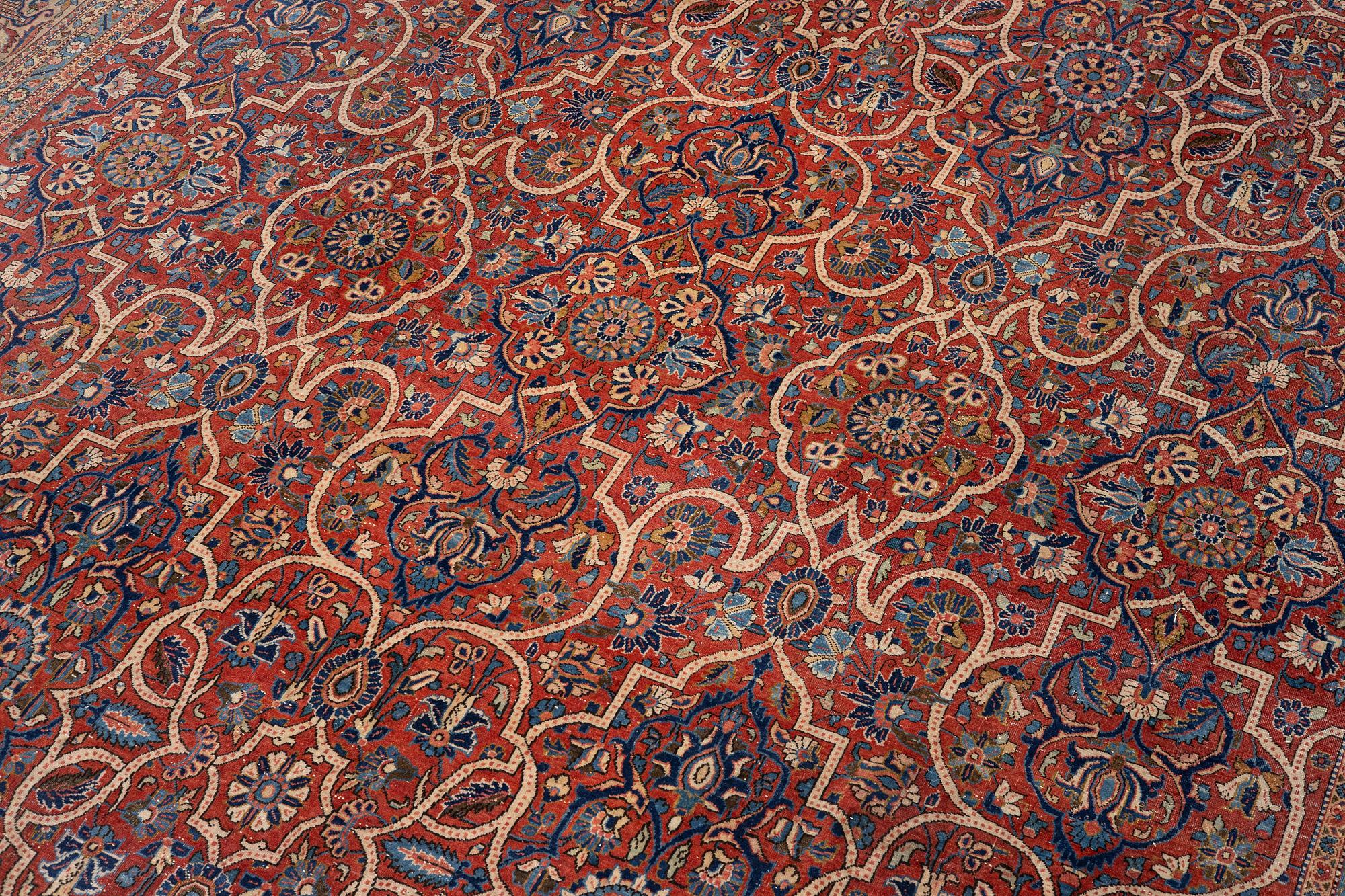 An oriental carpet, c. 425 x 305 cm.