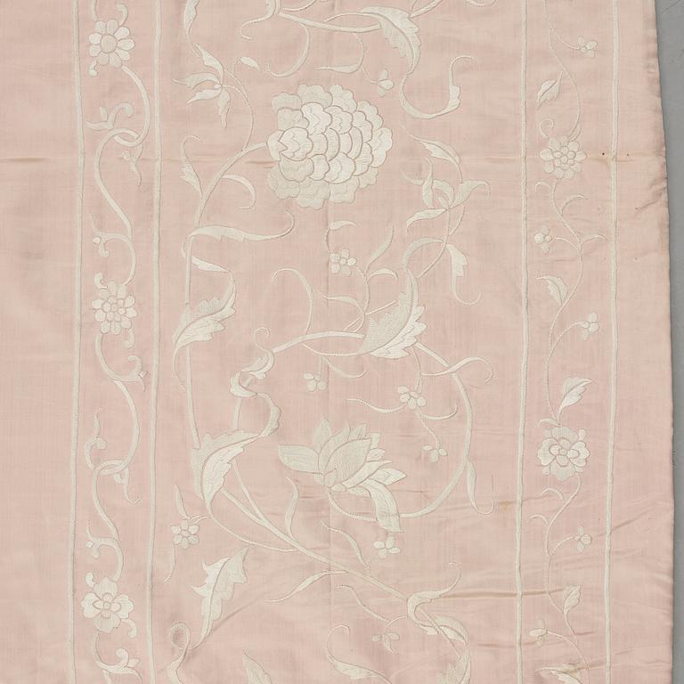 An embroidered silk bed spread, Qing dynasty, circa 1900.