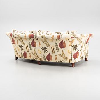 A curved sofa from Bröderna Andersson.