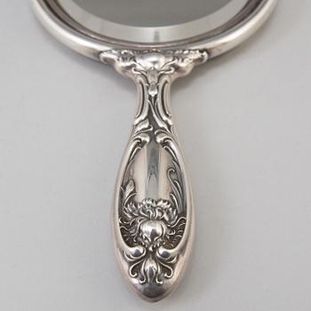 A sterling silver mirror from around year 1900.