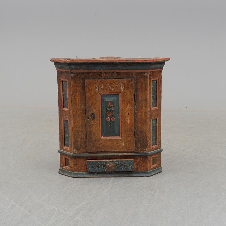 A 18/19th century  pine wall cabinet.