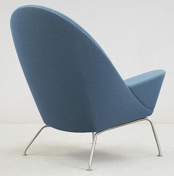 A Hans Wegner 'CH468' armchair, blue fabric, steel legs, Carl Hansen & Søn, Denmark.