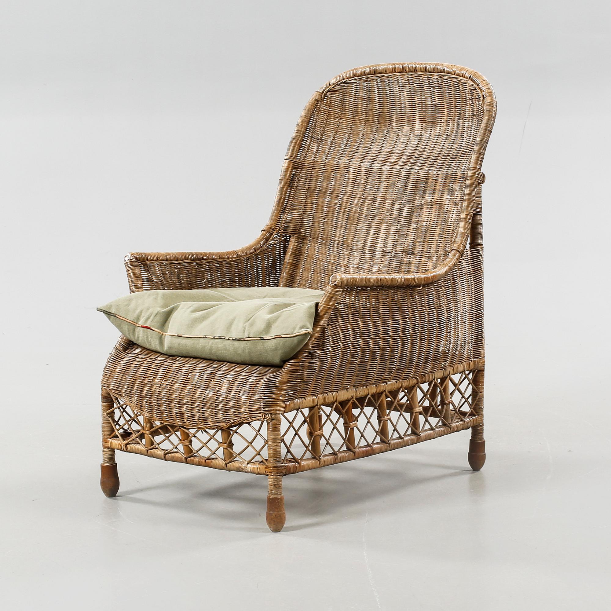 A rattan arm chair from the second half of the 20th century.