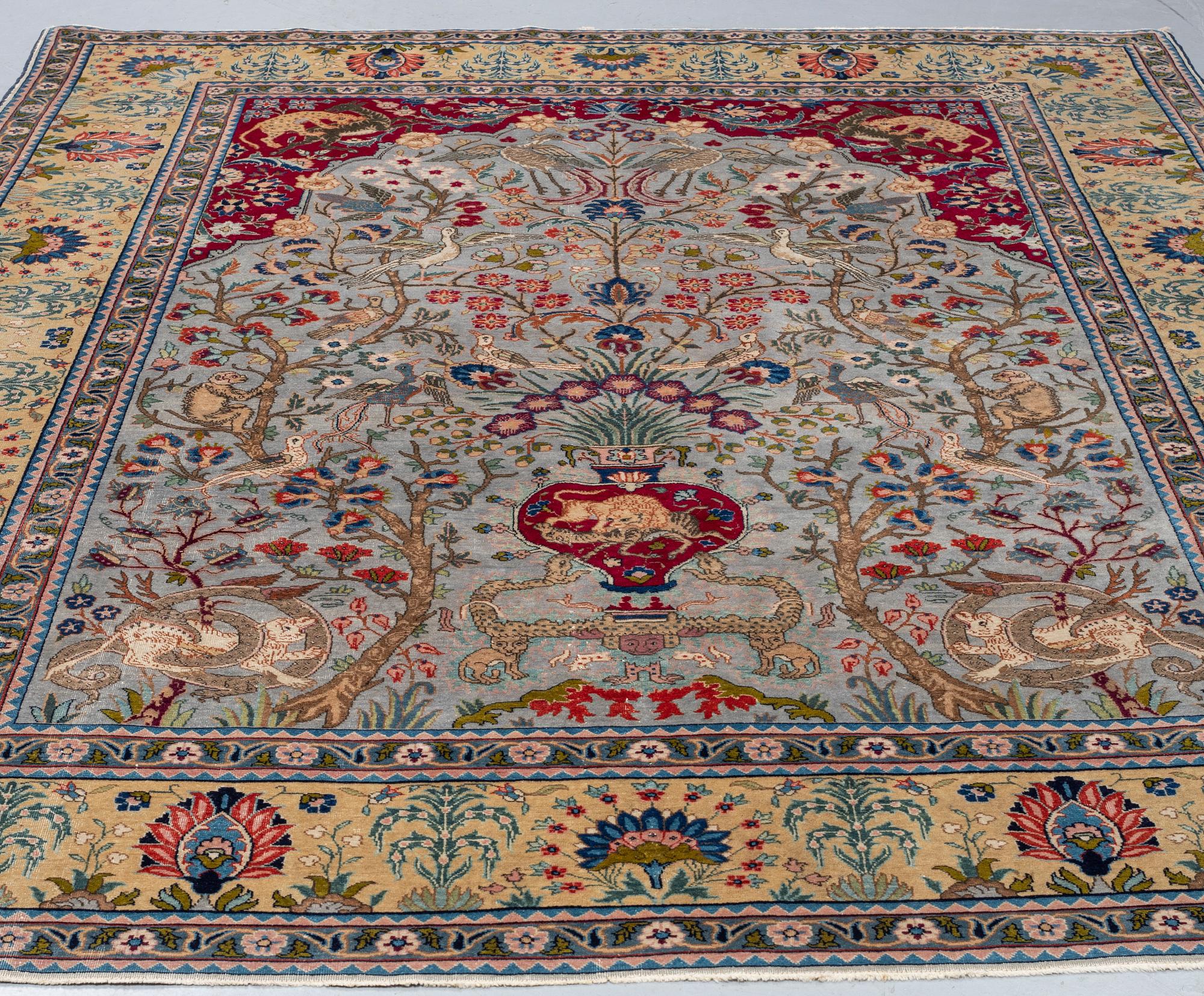 MATTO, a semi-antique Tabriz, ca 282,5-284,5 x 210-214,5 cm, inscriptions.