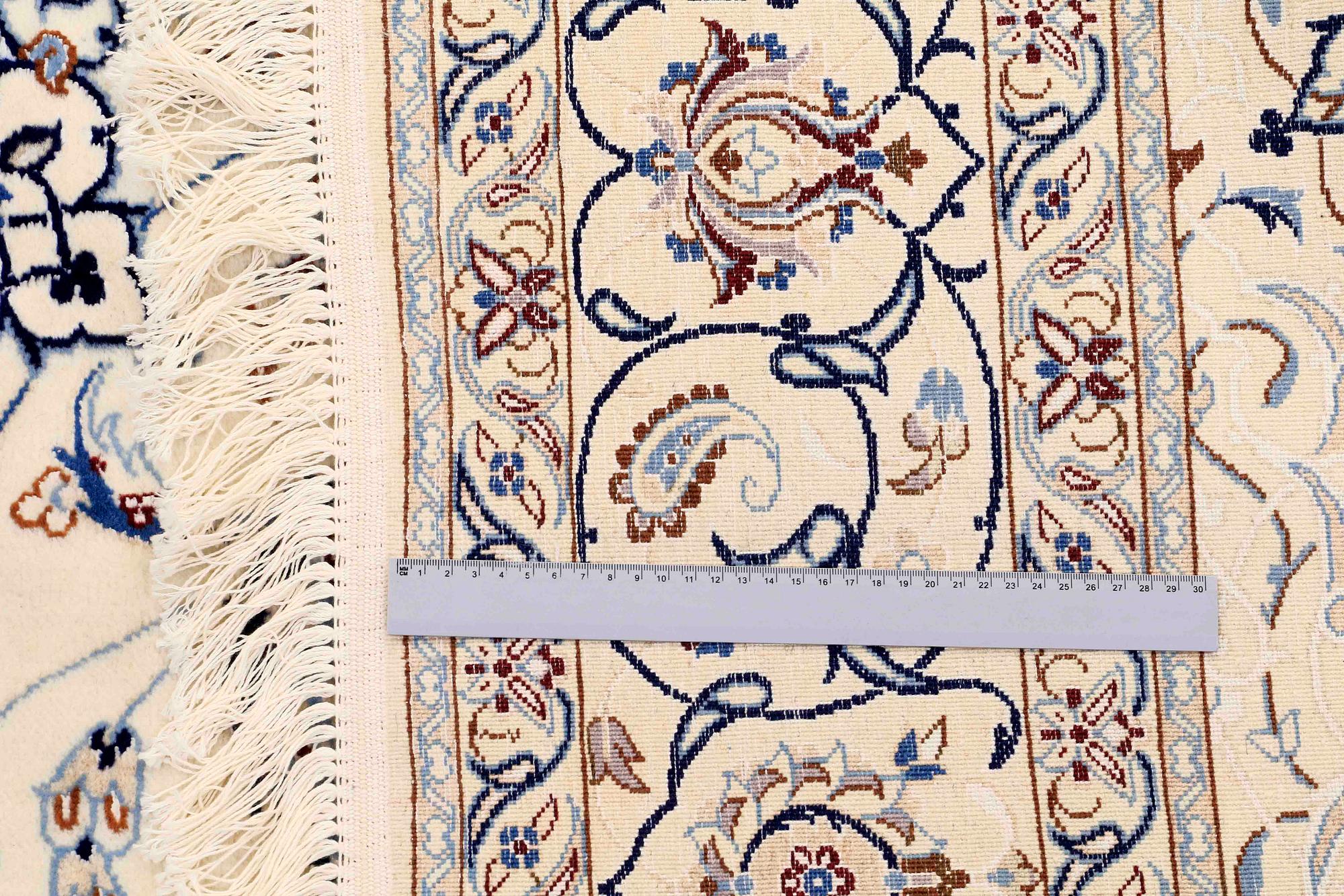 A CARPET, Nain part silk, s.k 9LAA, ca  303 x 202 cm.