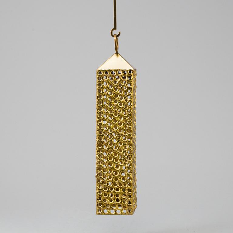 a brass ceiling light by Pierre Forsell for Skultuna.