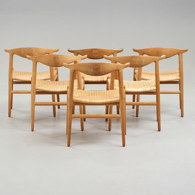 Hans J. Wegner, a set of six oak "Cowhorn Chairs", JH-505, Johannes Hansen, Denmark 1960's.