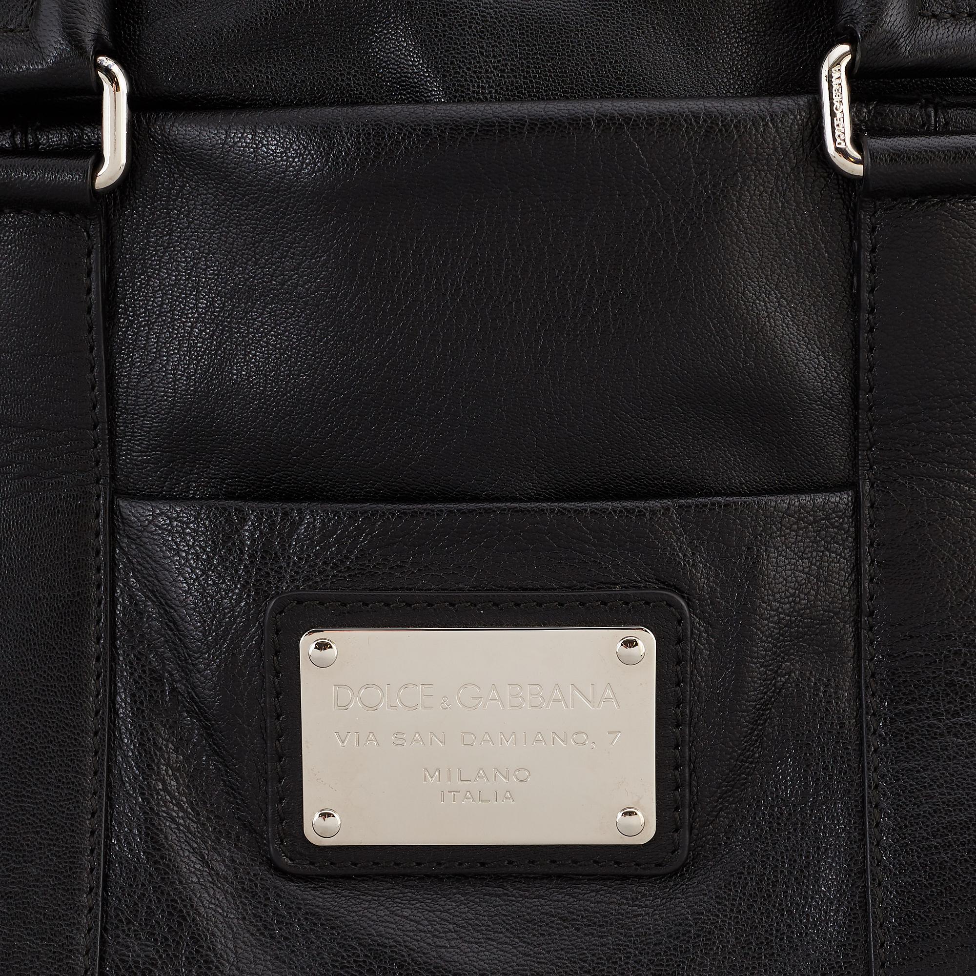 DOLCE & GABBANA, a black leather weekend bag, 2009.