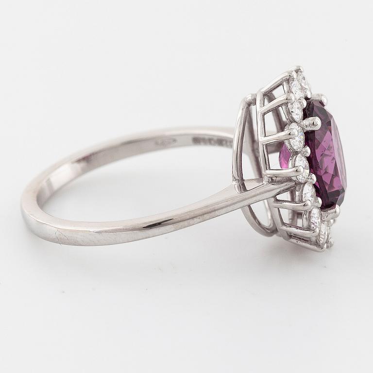 A rhodolite garnet and brilliant cut diamond ring.