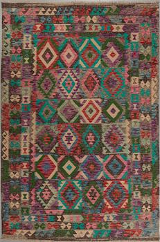 A kelim rug, 300 x 195 cm.