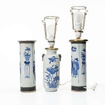 A group of three Chinese porcelain vases, two of them converted into table lamps, around 1900.