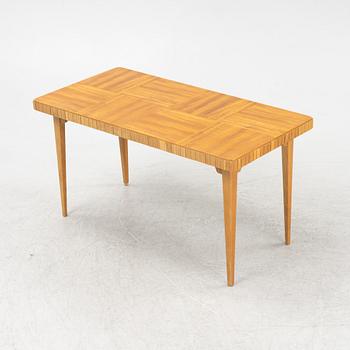 A mahogany-veneered Swedish Modern coffee table, Svenska Möbelfabriken Bodafors1940's/50's.