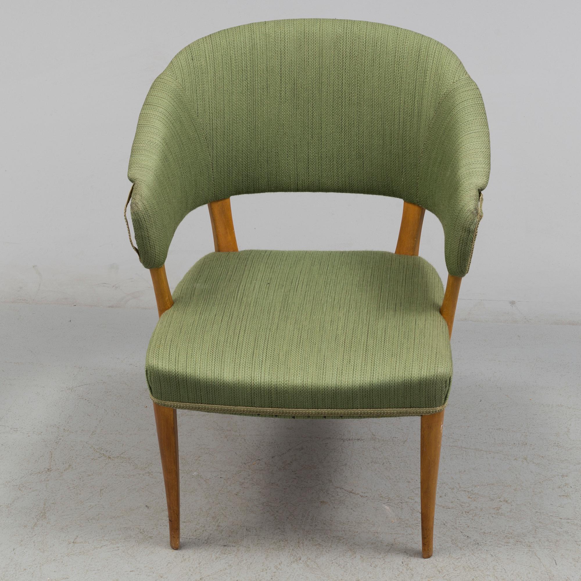 A "Lata Greven" armchair by Carl Malmsten.