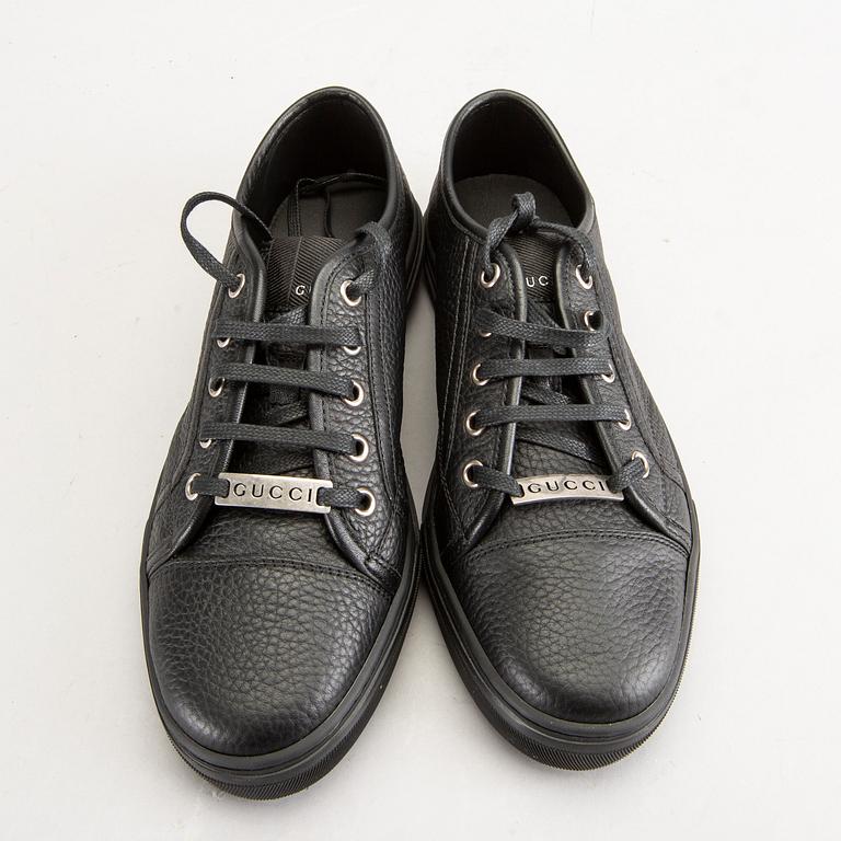 A piar of Gucci sneakers, size 37 1/2.