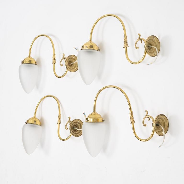 Four brass wall lights, second half of the 20th Century.