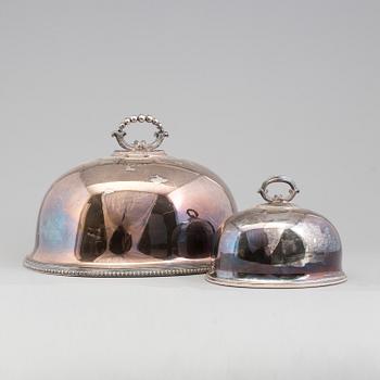 Two silver plated food covers, one by Thomas, New Bond Street, London, England, about 1900.