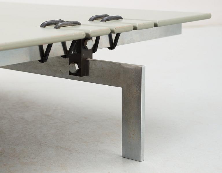 A Poul Kjaerholm 'Pk-80' brown leather aand steel daybed, Fritz Hansen, Denmark.