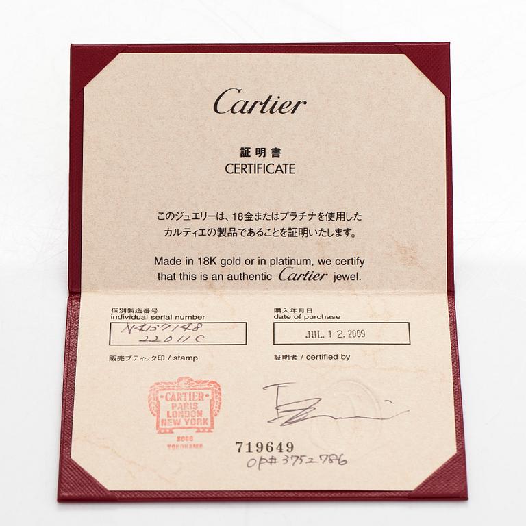 Cartier, a platinum ring, with a brilliant-cut diamond approx. 0.36 ct. With GIA dossier and certificate.