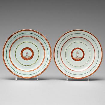 743. A pair of famille rose armorial dinner plates, Qing dynasty, Qianlong (1736-95).