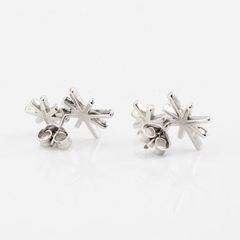 Efva Attling, a pair of "Beam & Stars Two Ear" earrings in rhodium-plated sterling silver with round brilliant-cut diamonds.