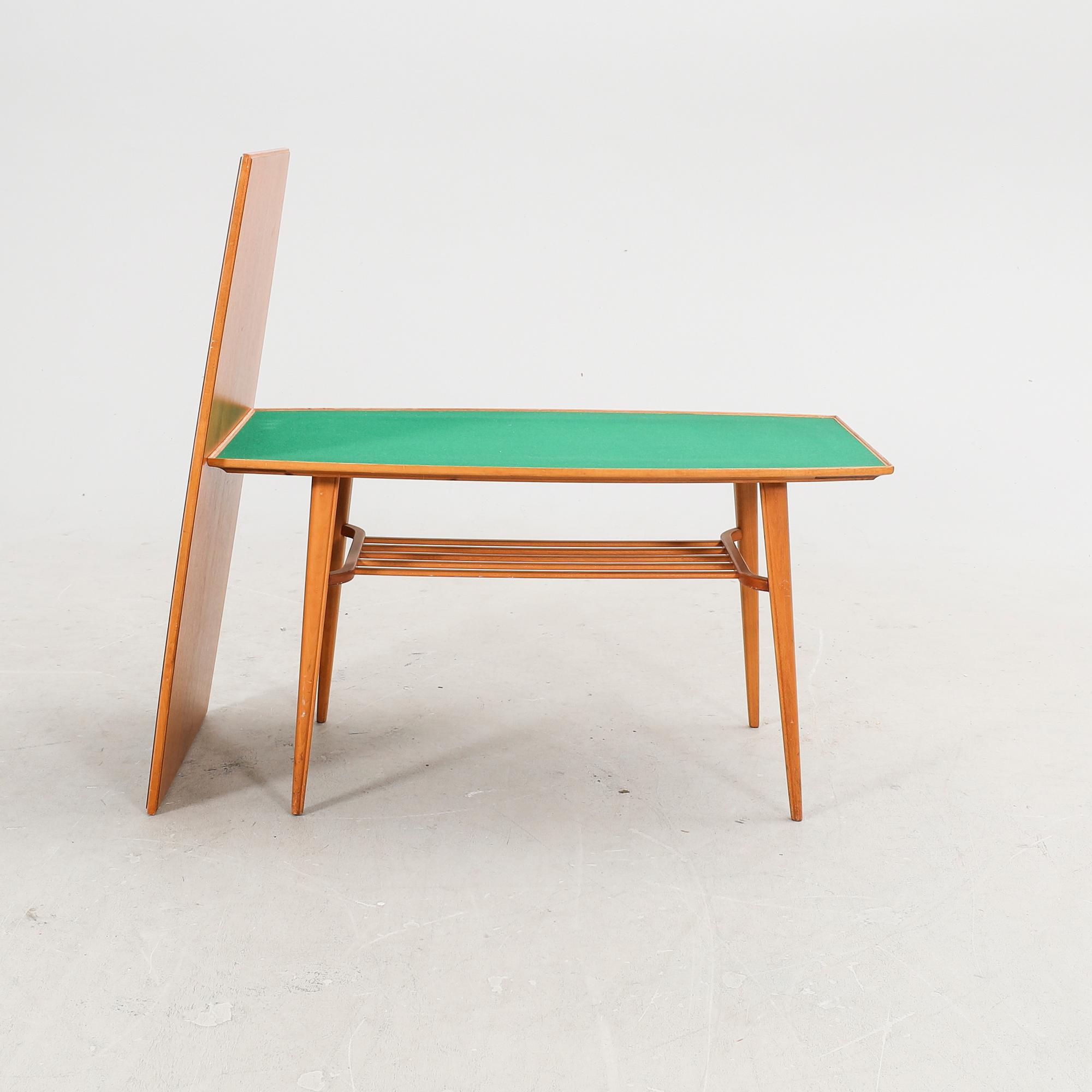 A 1960s teak coffee table.