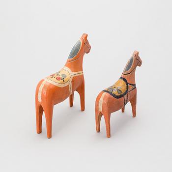 Two painted folk art dala horses first half of the 20th century.